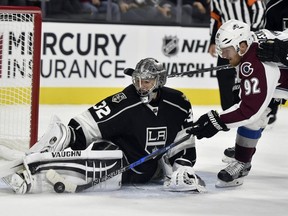 Los Angeles Kings goaltender Jonathan Quick blocks a shot by Colorado Avalanche's Gabriel Landeskog during the first period of an NHL preseason hockey game Saturday, Oct. 8, 2016, in Las Vegas. (AP/David Becker)