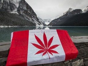 A cannabis-leaf parody of the Canadian flag sits for a photo illustration at Lake Louise, Alta., about 180 km west of Calgary, Alta., on Thursday, Oct. 13, 2016. Lake Louise is the top spot in Canada per capita for marijuana busts. Lyle Aspinall/Postmedia Network