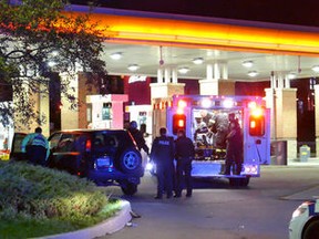 Emergency crews at a gas station near Creditview Rd. and Eglinton Ave. in Mississauga where two men were found with gunshot wounds.  Deshawn Brandon Nicholson was murdered nearby in a shooting. Police have not yet connected the two incidents. 2016. (Pascal Marchand/Special to the Toronto Sun)