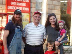 Tyler and Bria Atkins, shown with their children Navy and Ella, purchased Clark's Sports and More from third-generation owner Bill Clark. The Dresden business has been around since 1918.