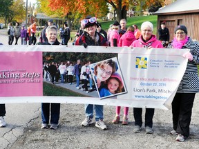Breast cancer survivors Marg Van Bakel (left), Sheila Rolph, Julie Van Bakel, Sharron Seebach and Colleen Pletsch led the 13th annual Taking Steps Against Breast Cancer walk held last Saturday, Oct. 22 at the Mitchell Lions Park. ANDY BADER MITCHELL ADVOCATE