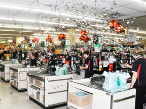 Kevin Hart of Walkom’s valu-mart shoots off a confetti cannon during the impromptu Market Moment held at the grocery store last Friday afternoon, Oct. 21. ANDY BADER MITCHELL ADVOCATE