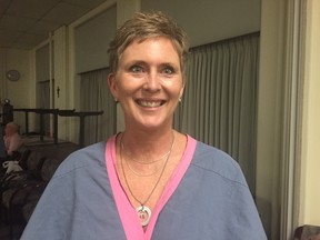 Breast cancer survivor Sue Adair is one of the women who volunteers to share her story and show her reconstructed breasts to women going through cancer. Jennifer O'Brien/The London Free Press