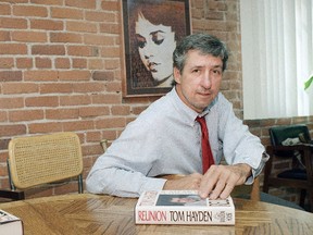 In this June 6, 1988 file photo, Tom Hayden talks about his new book, "Reunion," during a interview at his office in Santa Monica, Calif. Hayden, the famed 1960s anti-war activist who moved beyond his notoriety as a Chicago 8 defendant to become a California legislator, author and lecturer, has died. He was 76. His wife, Barbara Williams, says Hayden died on Sunday, Oct. 23, 2016, in Santa Monica of a long illness. (AP Photo/Lennox McLendon, File)