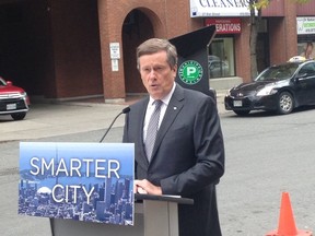 Mayor John Tory announcing that the Green P app will soon let you pay for street parking on Monday, Oct. 24, 2016 (Shawn Jeffords/Toronto Sun/Postmedia Network)