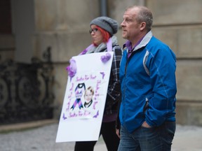 TORONTO, ONTARIO: Rodney Stafford (right), the father of murdered eight-year-old Victoria 'Tori' Stafford enters Osgoode Hall in Toronto, Ontario on Monday, October 24, 2016. Michael Rafferty is in court today to appeal his conviction for her murder. (Tyler Anderson/National Post)