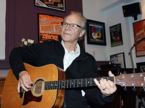 In this Dec. 18, 2013 file photo, Bobby Vee plays the guitar at his family's Rockhouse Productions in St. Joseph, Minn. (AP Photo/Jeff Baenen, File)
