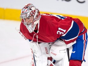 Montreal Canadiens goalie Carey Price is seen warming up prior to NHL pre-season hockey action on Oct. 6, 2016 in Montreal. (THE CANADIAN PRESS/Paul Chiasson)
