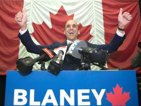 Conservative MP Steven Blaney waves to supporters at a Conservative Party brunch, Sunday, October 23, 2016 in Levis Que. (THE CANADIAN PRESS/Jacques Boissinot)