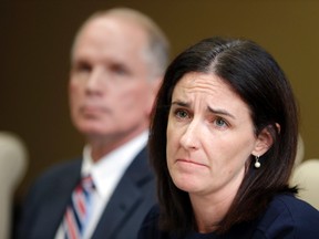 Katie McLaughlin, former wife of former Subway pitchman Jared Fogle, makes a statement on legal action filed on her behalf as attorney Mike Antrim looks on during a press conference in Noblesville, Ind., Monday, Oct. 24, 2016. Fogle was sentenced last year to more than 15 years in prison after pleading guilty to distributing and receiving child pornography and traveling out of state to engage in illicit sexual conduct with a minor. McLaughlin is suing the restaurant chain for damages, saying the company received three reports indicating his sexual interest in children but failed to take proper action and continued promoting him as their spokesman. (AP Photo/Michael Conroy)