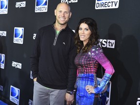 In this Saturday, Jan. 31, 2015, file photo, Josh Brown, left, and Molly Brown arrive at the 2015 DIRECTV Super Saturday Night at the Pendergast Family Farm, in Glendale, Ariz.