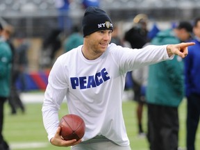 In this Dec. 28, 2014, file photo, New York Giants kicker Josh Brown points to a teammate as he warms up before an NFL football game against the Philadelphia Eagles, in East Rutherford. (AP Photo/Bill Kostroun, File)