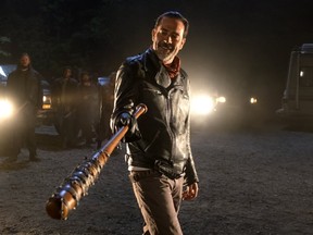 In this image released by AMC, Jeffrey Dean Morgan as Negan appears in a scene from 'The Walking Dead.' ‘The Walking Dead’ returned with a bloody bang for its seventh season as the victim of bat-wielding bad guy Negan was revealed in the Sunday, Oct. 23, 2016 premiere. (Gene Page/AMC via AP)