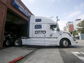 In this Aug. 18, 2016, file photo, one of Otto’s self-driving beer trucks leaves the garage for a test drive during a demonstration at the Otto headquarters in San Francisco. (AP Photo/Tony Avelar, File)