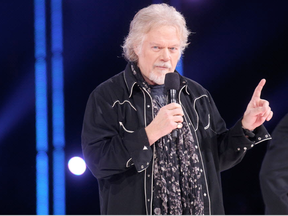 Randy Bachman speaks as Bachman Turner Overdrive is inducted into the Canadian Music Hall of Fame during the Juno Awards at MTS Centre in Winnipeg, Man., on March 30, 2014. (Kevin King/Postmedia)