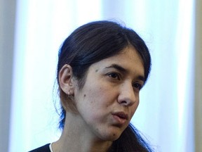 In this Wednesday, Dec. 30, 2015 file photo, Iraqi Yazidi Nadia Murad Basee Taha speaks with Greek President Prokopis Pavlopoulos during a meeting in Athens. An Islamic State rape victim, Pope Francis and the Afghan women's cycling team are among the known candidates for the 2016 Nobel Peace Prize as the nomination window was set to close Monday, Feb. 1, 2016. (AP Photo/Yorgos Karahalis, File)