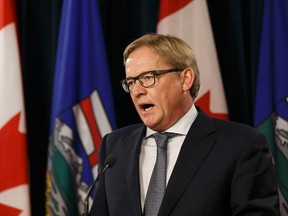 Alberta Education Minister David Eggen speaks about his department's closure of Trinity Christian School Association during a press conference at the Alberta Legislature in Edmonton, Alberta on Tuesday, October 25, 2016. (Ian Kucerak/Postmedia)