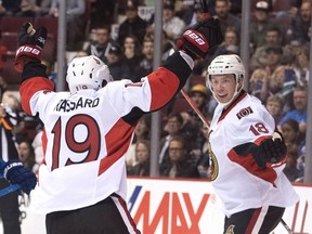 Senators left wing Ryan Dzingel (18) celebrates his goal with teammate Derick Brassard (19) during first period NHL action against the Canucks in Vancouver on Tuesday, Oct. 25, 2016. (Jonathan Hayward/The Canadian Press)