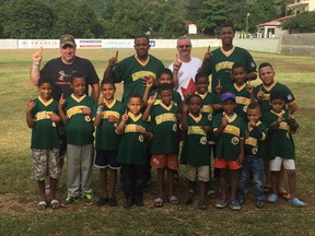 Submitted photo: Wallaceburg residents Brad and Carrie Falconer, and Matt Starr brought 50 Wallaceburg Warriors jerseys so kids playing baseball in the Dominican Republic can wear them. Brad Falconer said he wants to raise funds for the kids baseball program that he donated to.