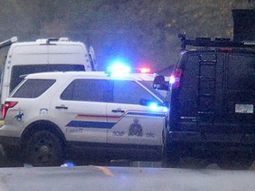 RCMP on scene at Robertson Cr. and 240 St. in Langley, B.C., Oct. 26, 2016. (NICK PROCAYLO/PostMedia)
