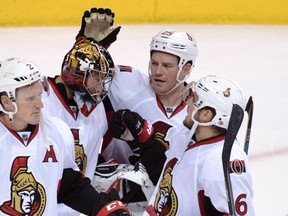 The Senators celebrate their win in Vancouver on Oct. 26. (The Canadian Press)