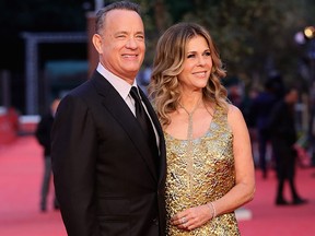 Tom Hanks and Rita Wilson walk a red carpet on Oct.13, 2016 in Rome, Italy.  (Vittorio Zunino Celotto/Getty Images)