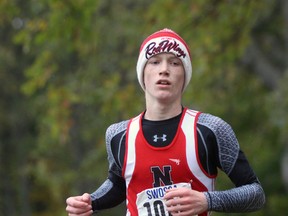 Stevie Schaefer of the Northern Vikings races towards the finish line during the SWOSSAA cross country meet in Canatara Park on Wednesday October 26, 2016 in Sarnia, Ont. Schaefer finished 38th in the junior boy's division. (Terry Bridge/Sarnia Observer)