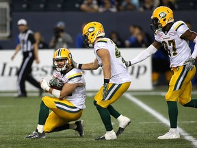 Neil King, shown here celebrating a touchdown off an interception against the Blue Bombers, is returning to Hamilton this weekend for the first time since joining the Eskimos. (Kevin King)