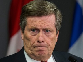 Mayor John Tory speaks to the media at City Hall in Toronto on Wednesday, October 26, 2016. (Craig Robertson/Toronto Sun)