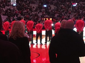 The Toronto Raptors stand with their hands behind their backs during the anthems Wednesday, Oct. 26, 2016 at the ACC. (Joe Warmington/Toronto Sun)