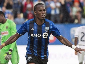 Montreal Impact's Didier Drogba celebrates after scoring against the Philadelphia Union during first half MLS action in Montreal on July 23, 2016. THE CANADIAN PRESS/Graham Hughes
