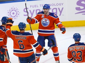 Benoit Pouliot celebrates a goal with his linemates as the Oilers went on to beat the Capitals 4-1 Wednesday at Rogers Place. (Ian Kucerak)