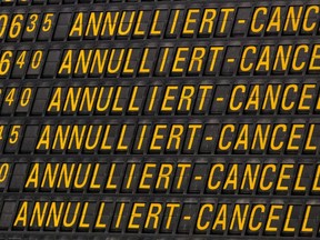 An information board displays cancelled flights at the airport Stuttgart, southern Germany, on October 27, 2016. (SILAS STEIN/AFP/Getty Images)