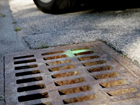 A proposed Adopt-A-Drain program shouldn't move forward, according to a city report. (FILE PHOTO)
