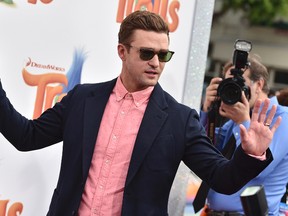 In this Oct. 23, 2016, file photo, Justin Timberlake arrives at the Los Angeles premiere of "Trolls." A ballot box selfie Timberlake took as he voted in his native Tennessee apparently violated a new state law that bars voters from taking photographs or video while they're inside a polling location. Timberlake told “Tonight Show” host Jimmy Fallon on Oct. 26, 2016, he “had no idea” the picture was illegal. (Photo by Jordan Strauss/Invision/AP, File)