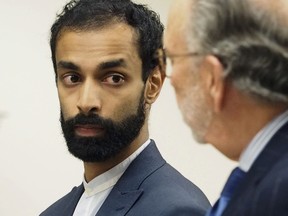 Dharun Ravi appears before Judge Joseph Paone Thursday, Oct. 27, 2016, in Middlesex County Superior Court, in New Brunswick, N.J. Ravi, a former Rutgers University student whose roommate killed himself after being captured on a webcam kissing another man pleaded guilty Thursday to attempted invasion of privacy. He was sentenced to probation plus 30 days in jail, and won’t serve any additional jail time under the plea agreement. He had faced up to 10 years in prison. (Patti Sapone/NJ Advance Media via AP, Pool)