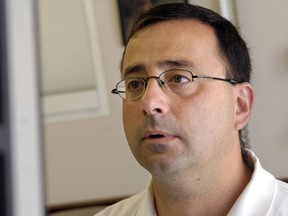 Dr. Larry Nassar, accused of sexual abuse by at least two gymnasts, was fired by Michigan State University in September 2016. (Becky Shink/Lansing State Journal via AP, File)