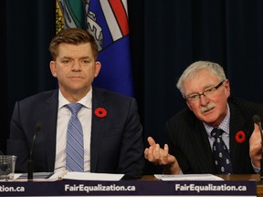 Alberta Wildrose Party Leader Brian Jean (left) and Dr. Frank Atkins (right/co-chair, Equalization Fairness Report) released the Equalization Fairness Panel report on October 27, 2016, which presents six new recommendations that can be used as a basis for getting a more fair and equitable equalization system for Alberta in the negotiations leading up to 2019. LARRY WONG/Postmedia