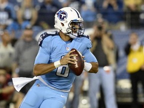 Titans quarterback Marcus Mariota rolls out against the Jaguars in the first half of an NFL game in Nashville, Tenn., on Thursday, Oct. 27, 2016. (Mark Zaleski/AP Photo)