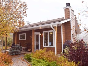 One of the rustic-luxe cabins at Alberta's Rocking R Guest Ranch, this one called Hitch N Post. STEVE MACNAULL PHOTO