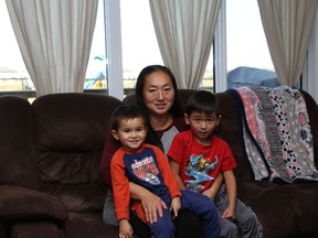Susan Webster and her children Gavin (right) and Declan in their Sterling Homes Tyndall in Stony Plain.