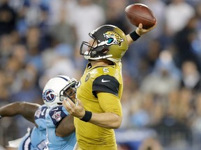 Blake Bortles of the Jacksonville Jaguars passes the ball while being pressured by Jurrell Casey of the Tennessee Titans during the first quarter of the game at Nissan Stadium on Oct. 27, 2016 in Nashville. (Andy Lyons/Getty Images)