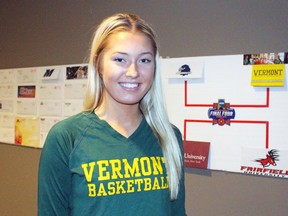 Carmen Handy is pictured by some of the letters she's received over the last three years from interested schools and the 'Final Four' she narrowed it down to before choosing the Vermont Catamounts. The 17-year-old Sarnia resident will be joining the NCAA Division I women's basketball team starting with the 2017-18 season. (Terry Bridge/Sarnia Observer)