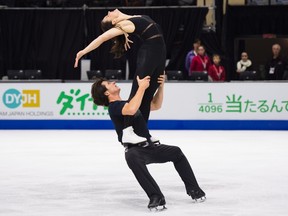 Canadians Tessa Virtue and Scott Moir perform in practice ahead of the Skate Canada International competition in Mississauga, Ont., on Oct. 27, 2016. (THE CANADIAN PRESS/Nathan Denette)