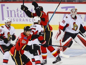 Ottawa Senators goalie Andrew Hammond reacts after giving up a goal to Dougie Hamilton of the Calgary Flames during NHL action in Calgary on Oct. 28, 2016. (AL CHAREST/POSTMEDIA)