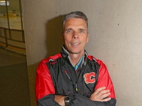 Calgary Flames assistant coach (and former Senators head coach) Dave Cameron says it’s great to see his old players. In 137 games in Ottawa, he had a 70-50-17 record. (Jim Wells/Postmedia Network)