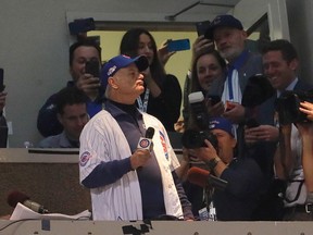 Actor Bill Murray sings "Take Me Out to the Ballgame" in the seventh inning of Game 3 of the 2016 World Series between the Chicago Cubs and the Cleveland Indians at Wrigley Field on Oct. 28, 2016 in Chicago. (Jamie Squire/Getty Images)