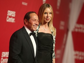 Singer Paul Anka (L) and guest attend the 2016 MusiCares Person of the Year honoring Lionel Richie at the Los Angeles Convention Center on February 13, 2016 in Los Angeles, California. (Photo by Christopher Polk/Getty Images for NARAS)