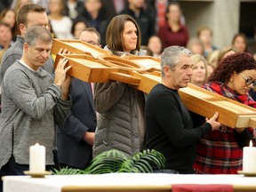 More than 600 teachers and staff of the Algonquin Lakeshore Catholic District School Board (ALCDSB) gather for Mass at St. Theresa Secondary School on Friday October 28, 2016 in Belleville, Ont. The gathering was part of the board's annual Faith Day. Tim Miller/Belleville Intelligencer/Postmedia Network