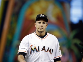 In this July 9, 2015, file photo, Miami Marlins starting pitcher Jose Fernandez walks to the dugout before a baseball game against the Cincinnati Reds in Miami.  (AP Photo/Lynne Sladky, File)